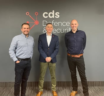 Richard Bradley, Richard Lee and Fergus Bailie in front of CDS DS logo